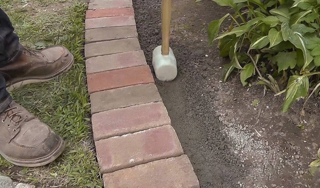 A picture of a garden with tips for installing stone landscape edging