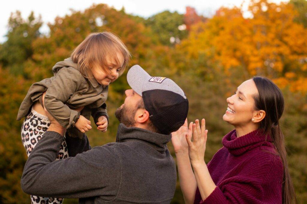 a family enjoying family time together in pittsburgh pa in the fall